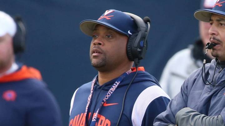 Virginia Cavaliers offensive coordinator Des Kitchings observes practice with fellow coaches. Virginia Cavaliers offensive coordinator Des Kitchings observes practice with fellow coaches.