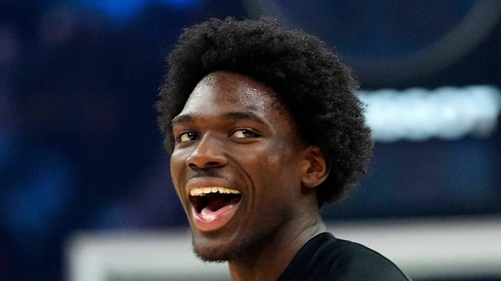 Suns forward Rasheer Fleming (20) laughs with his teammates prior to a game against the Bucks at the Mortgage Matchup Center in Phoenix on March 21, 2026.