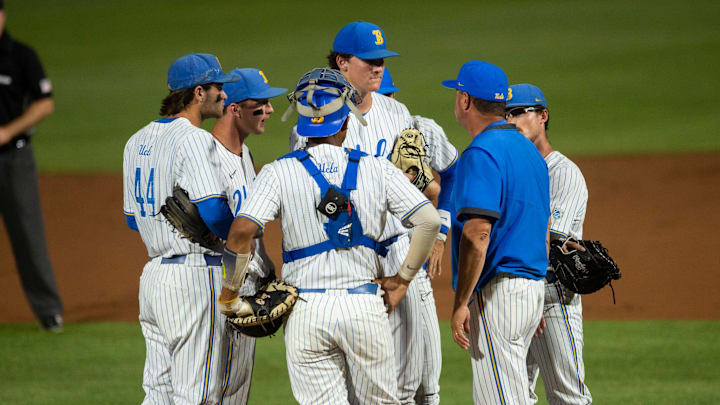 UCLA Bruins team huddles during a break in the action as Auburn Tigers take on UCLA Bruins during the NCAA regional baseball tournament at Plainsman Park in Auburn, Ala., on Sunday, June 5, 2022.