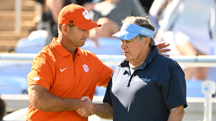 Oct 4, 2025; Chapel Hill, North Carolina, USA; Clemson Tigers head coach Dabo Swinney with North Carolina Tar Heels head coach Bill Belichick before the game at Kenan Stadium. Mandatory Credit: Bob Donnan-Imagn Images Oct 4, 2025; Chapel Hill, North Carolina, USA; Clemson Tigers head coach Dabo Swinney with North Carolina Tar Heels head coach Bill Belichick before the game at Kenan Stadium. Mandatory Credit: Bob Donnan-Imagn Images