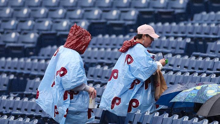 May 23, 2026; Philadelphia, Pennsylvania, USA; Fans leave the seating area as a rain delay is announced before a game between the Philadelphia Phillies and the Cleveland Guardians at Citizens Bank Park. Mandatory Credit: Bill Streicher-Imagn Images