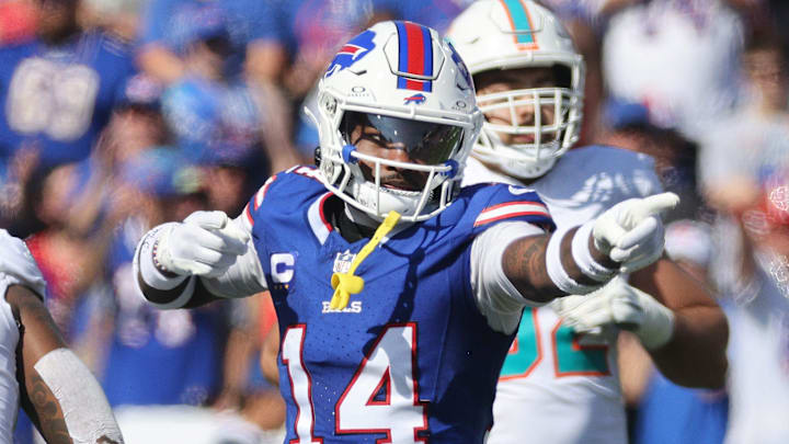 Bills receiver Stefon Diggs signals a first down after a catch.