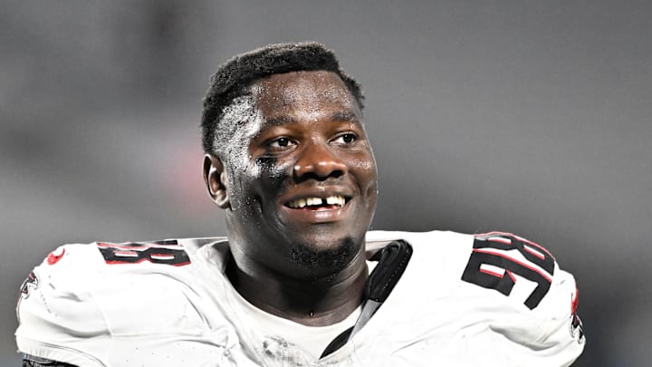 Oct 13, 2024; Charlotte, North Carolina, USA; Atlanta Falcons defensive tackle Ruke Orhorhoro (98) walks off the field after the game at Bank of America Stadium. Mandatory Credit: Bob Donnan-Imagn Images