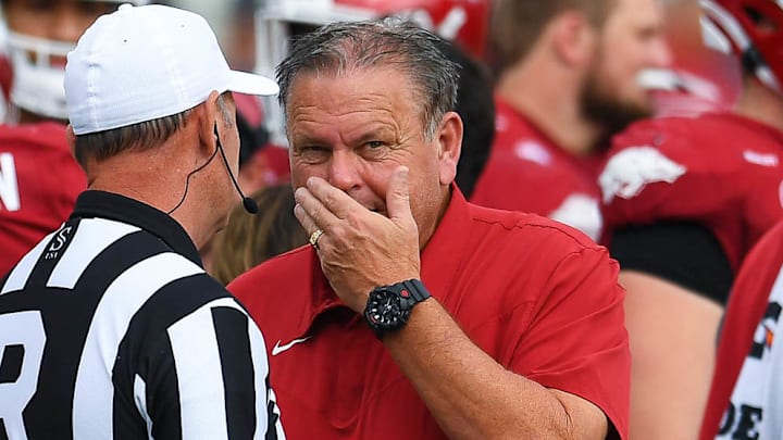 Arkansas Razorbacks coach Sam Pittman talks with official during win over UAPB at War Memorial Stadium in Little Rock, Ark.