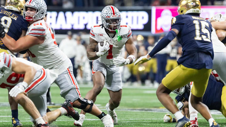 Jan 20, 2025; Atlanta, GA, USA; Ohio State Buckeyes running back Quinshon Judkins (1) against the Notre Dame Fighting Irish during the CFP National Championship college football game at Mercedes-Benz Stadium. 