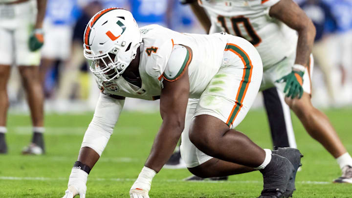 Jan 8, 2026; Glendale, AZ, USA; Miami Hurricanes defensive lineman Rueben Bain Jr. (4) against the Mississippi Rebels during the 2026 Fiesta Bowl and semifinal game of the College Football Playoff at State Farm Stadium. Mandatory Credit: Mark J. Rebilas-Imagn Images