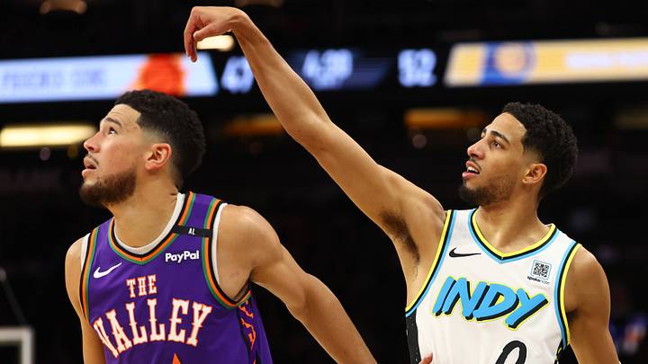 Dec 19, 2024; Phoenix, Arizona, USA; Indiana Pacers guard Tyrese Haliburton (0) against Phoenix Suns guard Devin Booker (1) at Footprint Center. Mandatory Credit: Mark J. Rebilas-Imagn Images Dec 19, 2024; Phoenix, Arizona, USA; Indiana Pacers guard Tyrese Haliburton (0) against Phoenix Suns guard Devin Booker (1) at Footprint Center. Mandatory Credit: Mark J. Rebilas-Imagn Images