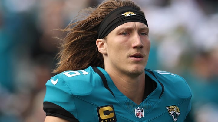 Jan 11, 2026; Jacksonville, FL, USA; Jacksonville Jaguars quarterback Trevor Lawrence (16) runs on the field before an AFC Wild Card Round game against the Buffalo Bills at EverBank Stadium. Mandatory Credit: Nathan Ray Seebeck-Imagn Images