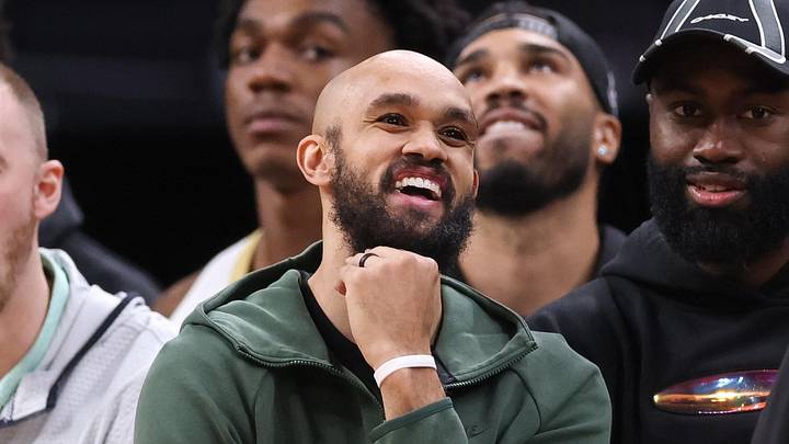 Apr 12, 2026; Boston, Massachusetts, USA; Boston Celtics guard Derrick White (9) reacts during the second half against the Orlando Magic at TD Garden. Mandatory Credit: Paul Rutherford-Imagn Images
