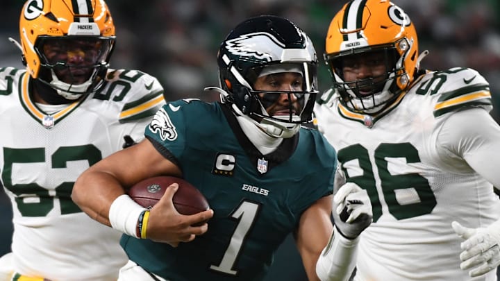 Philadelphia Eagles quarterback Jalen Hurts rushes the ball against the Green Bay Packers during their NFC wild-card game.