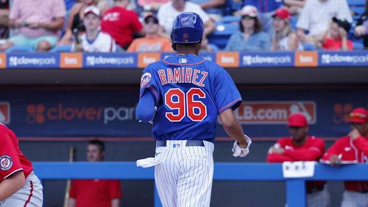 Feb 26, 2023; Port St. Lucie, Florida, USA; New York Mets outfielder Alex Ramirez crosses the plate to score as Washington Nationals catcher Brady Lindsly waits on the ball during the seventh inning at Clover Park. Mandatory Credit: Reinhold Matay-Imagn Images