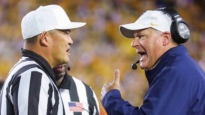 Sep 26, 2026; Morgantown, West Virginia, USA; West Virginia Mountaineers head coach Rich Rodriguez argues a call during the first quarter against the Oklahoma State Cowboys at Milan Puskar Stadium. Mandatory Credit: Ben Queen-Imagn Images Sep 26, 2026; Morgantown, West Virginia, USA; West Virginia Mountaineers head coach Rich Rodriguez argues a call during the first quarter against the Oklahoma State Cowboys at Milan Puskar Stadium. Mandatory Credit: Ben Queen-Imagn Images