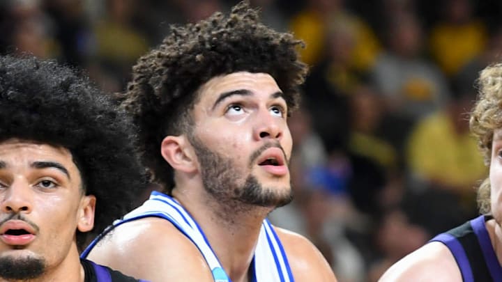 TCU Horned Frogs forward David Punch (15) and TCU Horned Frogs guard Liutauras Lelevicius (3) box out Duke Blue Devils forward Cameron Boozer (12) Saturday, March 21, 2026, during the NCAA Men’s Basketball Tournament second round game at Bon Secours Wellness Arena in Greenville, South Carolina.