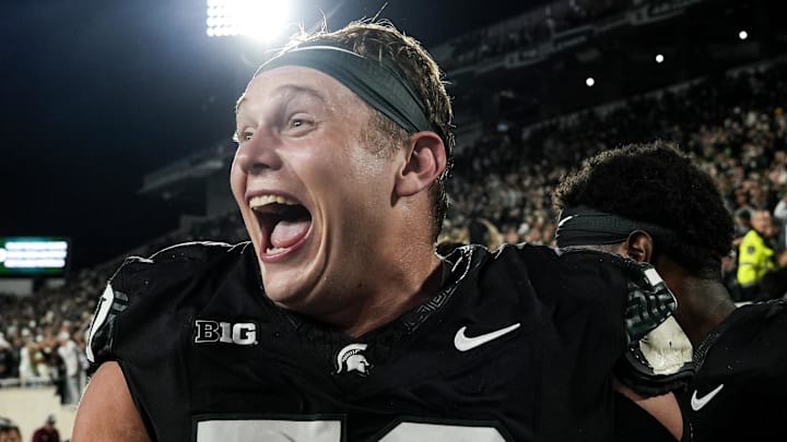 Sep 6, 2025; East Lansing, Michigan, USA; Michigan State offensive lineman Luka Vincic (70) celebrates a double-overtime victory over Boston College at Spartan Stadium. Mandatory Credit: Brendan Mullin-Imagn Images