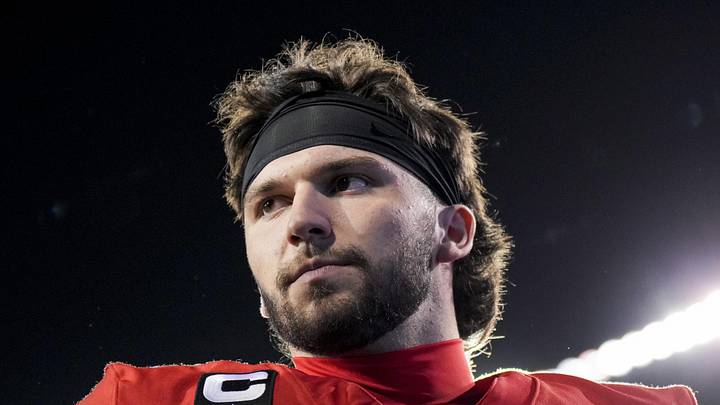 Cincinnati Bearcats quarterback Brendan Sorsby points to fans