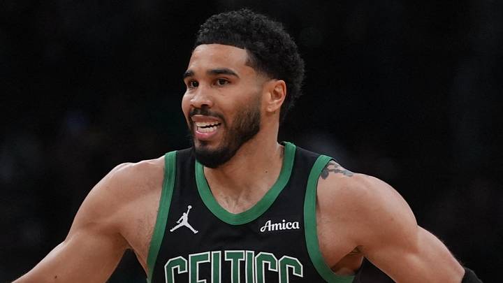 Apr 28, 2026; Boston, Massachusetts, USA; Boston Celtics forward Jayson Tatum (0) and center Luka Garza (52) react after a play against the Philadelphia 76ers in the second quarter during game five of the first round of the 2026 NBA Playoffs at TD Garden. Mandatory Credit: David Butler II-Imagn Images