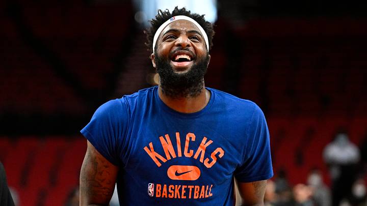 Feb 12, 2022; Portland, Oregon, USA;  New York Knicks center Mitchell Robinson (23) reacts during a light-hearted moment while warming up before a game against the Portland Trail Blazers at Moda Center. Mandatory Credit: Troy Wayrynen-USA TODAY Sports