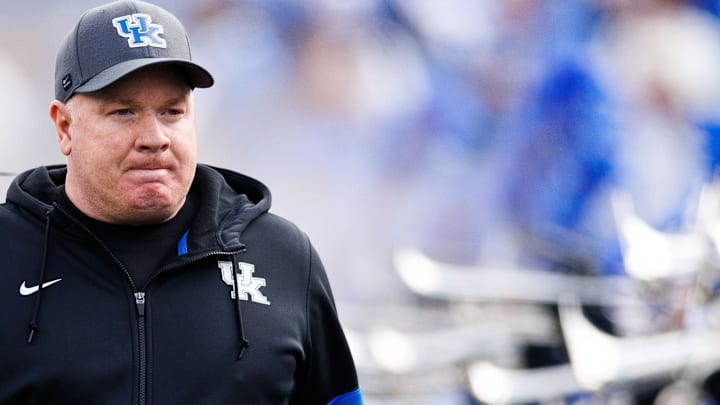 Nov 16, 2024; Lexington, Kentucky, USA; Kentucky Wildcats head coach Mark Stoops walks onto the field before the game against the Murray State Racers at Kroger Field. Mandatory Credit: Jordan Prather-Imagn Images
