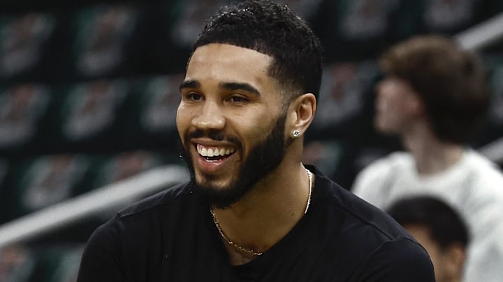 Feb 28, 2025; Boston, Massachusetts, USA; Boston Celtics forward Jayson Tatum (0) shares a laugh with Cleveland Cavaliers center Tristan Thompson (13) at TD Garden. Mandatory Credit: Winslow Townson-Imagn Images