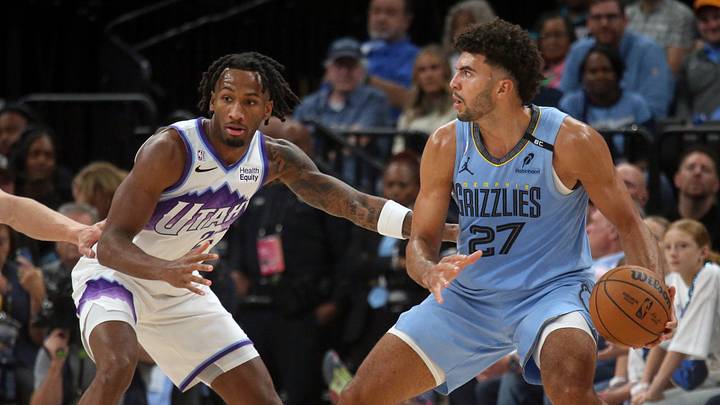 Oct 21, 2026; Memphis, Tennessee, USA; Memphis Grizzlies forward Cameron Boozer (27) dribbles against Utah Jazz guard Darryn Peterson (22) during the fourth quarter at FedExForum. Mandatory Credit: Petre Thomas-Imagn Images Oct 21, 2026; Memphis, Tennessee, USA; Memphis Grizzlies forward Cameron Boozer (27) dribbles against Utah Jazz guard Darryn Peterson (22) during the fourth quarter at FedExForum. Mandatory Credit: Petre Thomas-Imagn Images
