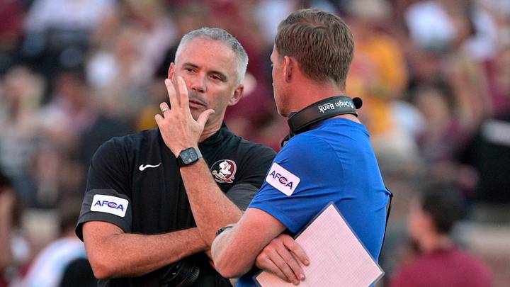 Sep 7, 2026; Tallahassee, Florida, USA; Florida State Seminoles head coach Mike Norvell and Southern Methodist Mustangs head coach Rhett Lashlee talk during a delay due to a power outage before the game at Doak S. Campbell Stadium. Mandatory Credit: Melina Myers-Imagn Images Sep 7, 2026; Tallahassee, Florida, USA; Florida State Seminoles head coach Mike Norvell and Southern Methodist Mustangs head coach Rhett Lashlee talk during a delay due to a power outage before the game at Doak S. Campbell Stadium. Mandatory Credit: Melina Myers-Imagn Images