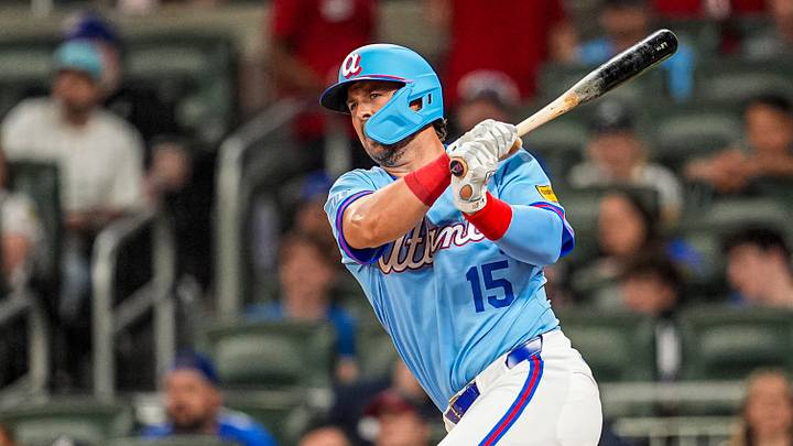 Apr 12, 2026; Cumberland, Georgia, USA; Atlanta Braves pinch hitter Kyle Farmer (15) hits a double to drive in two runs against the Cleveland Guardians during the fifth inning at Truist Park. Mandatory Credit: Dale Zanine-Imagn Images Apr 12, 2026; Cumberland, Georgia, USA; Atlanta Braves pinch hitter Kyle Farmer (15) hits a double to drive in two runs against the Cleveland Guardians during the fifth inning at Truist Park. Mandatory Credit: Dale Zanine-Imagn Images