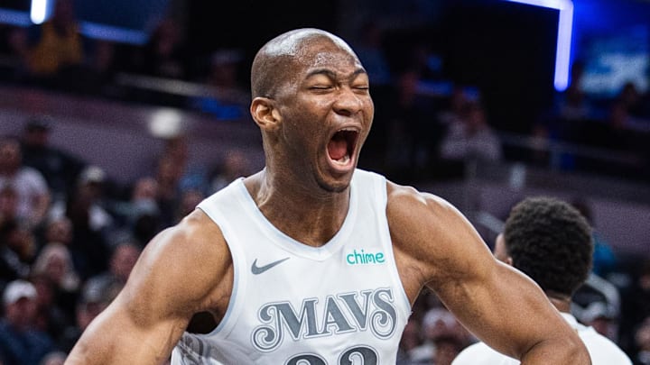 Mar 19, 2025; Indianapolis, Indiana, USA; Dallas Mavericks forward Kai Jones (23) celebrates a made basket in the second half against the Indiana Pacers at Gainbridge Fieldhouse. Mandatory Credit: Trevor Ruszkowski-Imagn Images