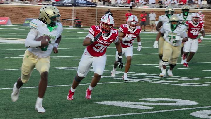 Buford quarterback DJ Hunter turns the corner for his second touchdown of the game. Buford quarterback DJ Hunter turns the corner for his second touchdown of the game.
