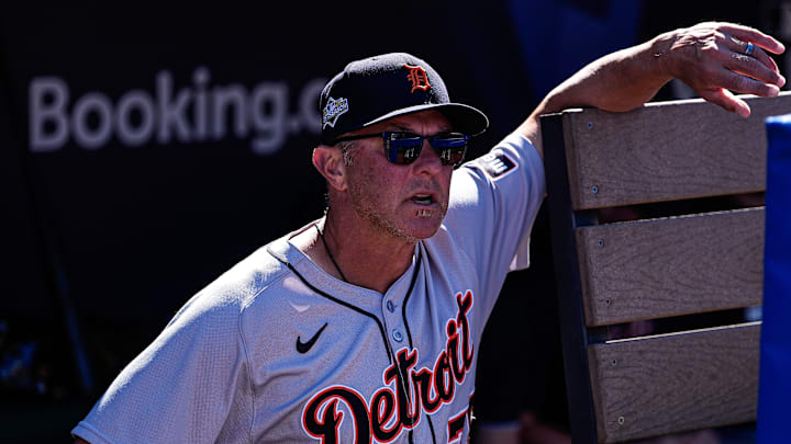 Detroit Tigers first base coach Anthony Iapoce (76) watches warm up from the dugout before Game 2 of AL wild-card series against Cleveland Guardians at Progressive Field in Cleveland, Ohio on Wednesday, Oct. 1, 2025.