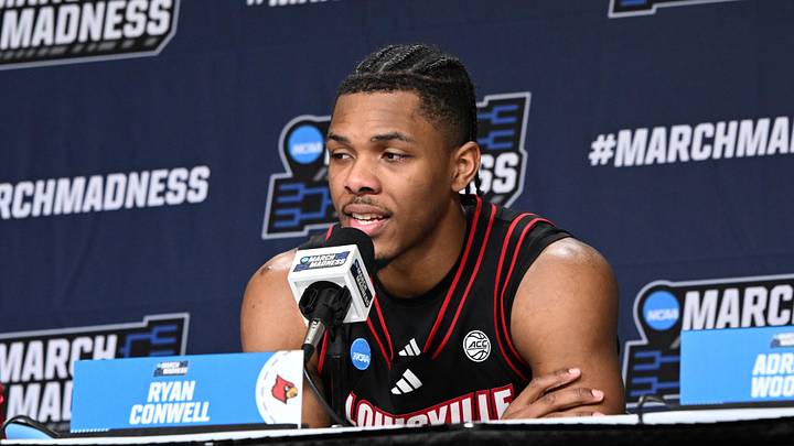 Mar 21, 2026; Buffalo, NY, USA; Louisville Cardinals guard Ryan Conwell (3) speaks with media after the second round game of the men's 2026 NCAA Tournament against the Michigan State Spartans at Keybank Center. Mandatory Credit: Mark Konezny-Imagn Images