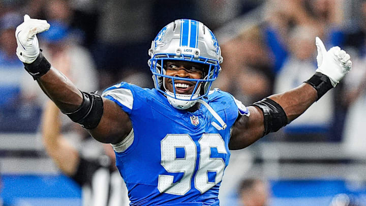 Detroit Lions linebacker Al-Quadin Muhammad (96) celebrates a tackle against Chicago Bears Detroit Lions linebacker Al-Quadin Muhammad (96) celebrates a tackle against Chicago Bears