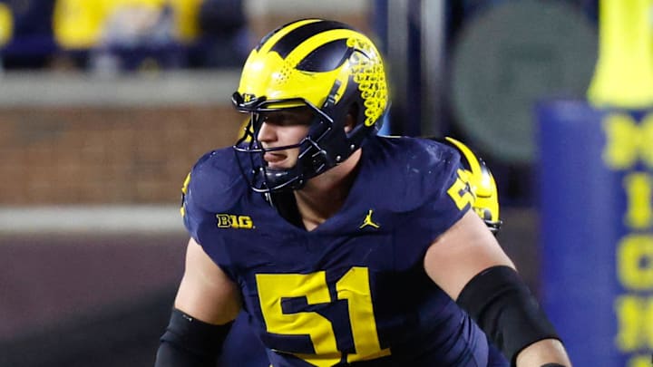 Nov 23, 2024; Ann Arbor, Michigan, USA;  Michigan Wolverines offensive lineman Greg Crippen (51) blocks against the Northwestern Wildcats at Michigan Stadium. Mandatory Credit: Rick Osentoski-Imagn Images