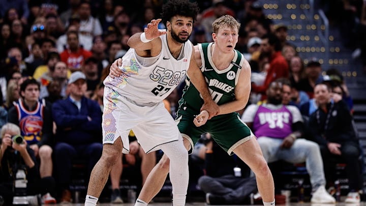 Mar 26, 2025; Denver, Colorado, USA; Denver Nuggets guard Jamal Murray (27) calls for the ball as Milwaukee Bucks guard AJ Green (20) guards in the fourth quarter at Ball Arena. Mandatory Credit: Isaiah J. Downing-Imagn Images