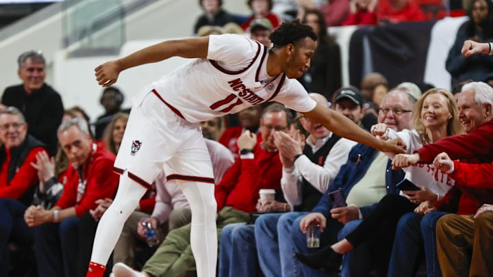 Feb 7, 2026; Raleigh, North Carolina, USA;  NC State Wolfpack guard Quadir Copeland (11) thanks the fans during the second half of the game against the Virginia Tech Hokies at Lenovo Center. Mandatory Credit: Jaylynn Nash-Imagn Images