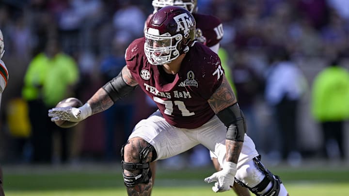 Dec 20, 2025; College Station, TX, USA; Texas A&M Aggies offensive lineman Chase Bisontis (71) blocks the rush during the game between the Aggies and the Hurricanes at Kyle Field. Mandatory Credit: Jerome Miron-Imagn Images