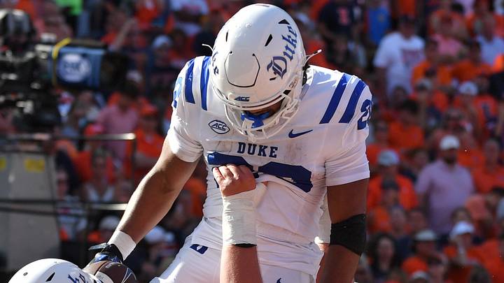 Sep 12, 2026; Champaign, Illinois, USA;  Duke Blue Devils running back Nate Sheppard (20) celebrates his second quarter touchdown with teammates against the Illinois Fighting Illini at Gies Memorial Stadium.  Mandatory Credit: Ron Johnson-Imagn Images