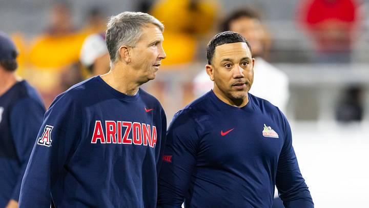 Nov 28, 2025; Tempe, Arizona, USA; Arizona Wildcats head coach Brent Brennan (left) with wide receivers coach Bobby Wade. Nov 28, 2025; Tempe, Arizona, USA; Arizona Wildcats head coach Brent Brennan (left) with wide receivers coach Bobby Wade.