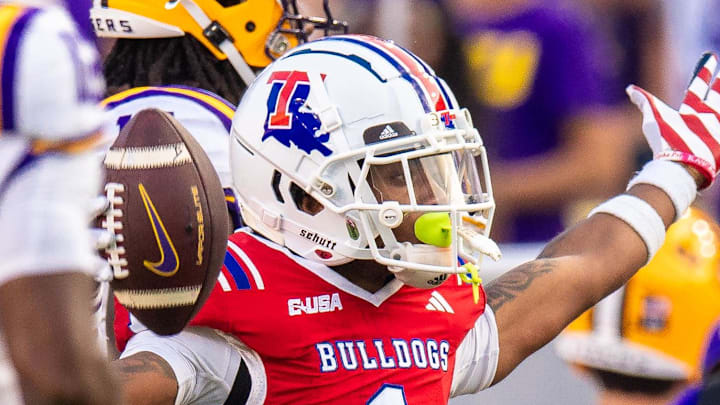 Sep 6, 2025; Baton Rouge, Louisiana, USA;  Louisiana Tech Bulldogs defensive back Michael Richard (1) intercepts a pass from LSU Tigers quarterback Garrett Nussmeier (not pictured) during the first half against Louisiana Tech Bulldogs at Tiger Stadium.