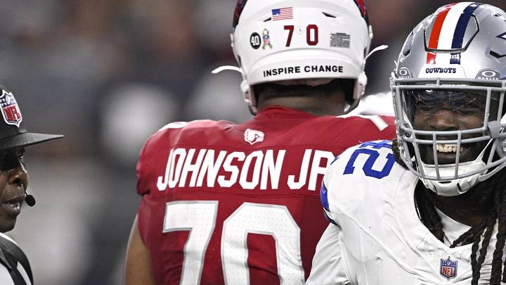 Nov 3, 2025; Arlington, Texas, USA; Dallas Cowboys defensive end Jadeveon Clowney (42) reacts after a sack against Arizona Cardinals quarterback Jacoby Brissett (7) in the first half at AT&T Stadium. 