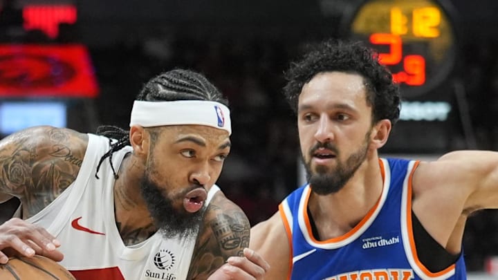 Toronto Raptors forward Brandon Ingram drives to the basket against New York Knicks guard Landry Shamet.