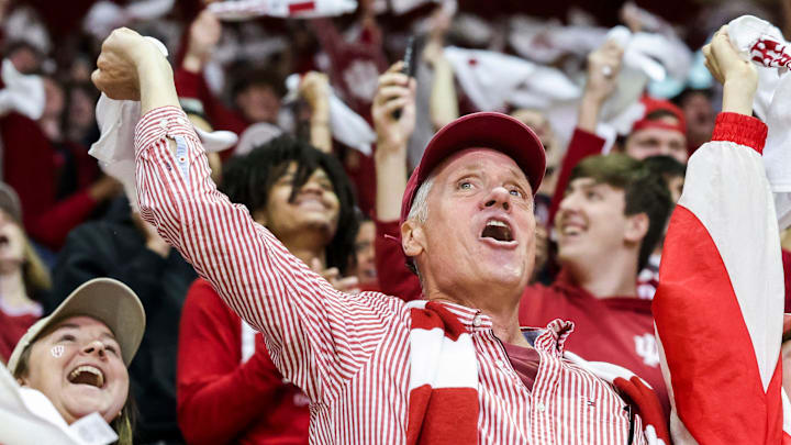 Fans celebrate Monday, Jan. 19, 2026, during a watch party for the College Football Playoff national championship game between the Indiana Hoosiers and the Miami Hurricanes at Simon Skjodt Assembly Hall in Bloomington, Ind.