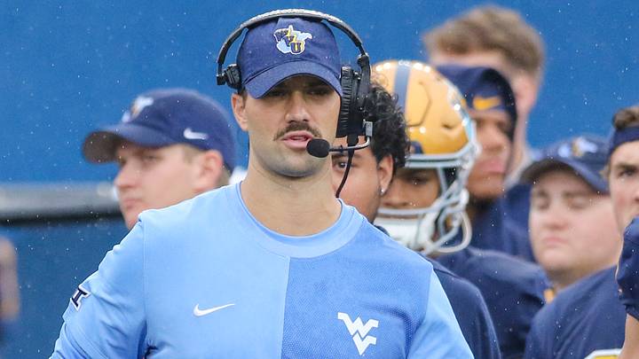 Sep 27, 2025; Morgantown, West Virginia, USA; West Virginia Mountaineers defensive coordinator Zac Alley talks to his players during the first quarter against the Utah Utes at Milan Puskar Stadium. Mandatory Credit: Ben Queen-Imagn Images Sep 27, 2025; Morgantown, West Virginia, USA; West Virginia Mountaineers defensive coordinator Zac Alley talks to his players during the first quarter against the Utah Utes at Milan Puskar Stadium. Mandatory Credit: Ben Queen-Imagn Images
