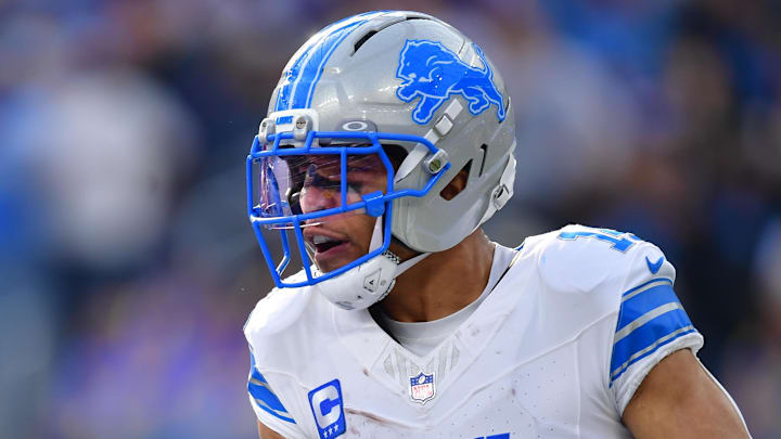 Detroit Lions wide receiver Amon-Ra St. Brown (14).