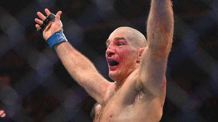 May 9, 2026; Newark, New Jersey, UNITED STATES; Sean Strickland (blue gloves) celebrates after defeating Khamzat Chimaev (red gloves) during UFC 328 at Prudential Center. Mandatory Credit: John Jones-Imagn Images May 9, 2026; Newark, New Jersey, UNITED STATES; Sean Strickland (blue gloves) celebrates after defeating Khamzat Chimaev (red gloves) during UFC 328 at Prudential Center. Mandatory Credit: John Jones-Imagn Images