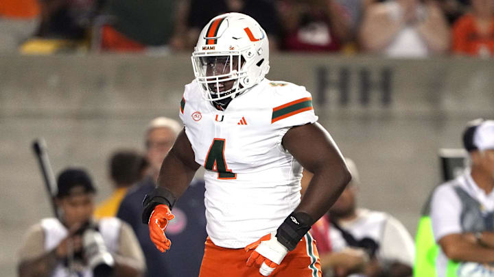 Oct 5, 2024; Berkeley, California, USA; Miami Hurricanes defensive lineman Rueben Bain Jr. (4) reacts after a tackle against the California Golden Bears during the first quarter at California Memorial Stadium. Mandatory Credit: Darren Yamashita-Imagn Images