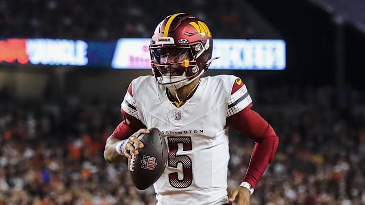 Sep 23, 2024; Cincinnati, Ohio, USA; Washington Commanders quarterback Jayden Daniels (5) runs the ball in for a touchdown against the Cincinnati Bengals at Paycor Stadium. Mandatory Credit: Katie Stratman-Imagn Images Sep 23, 2024; Cincinnati, Ohio, USA; Washington Commanders quarterback Jayden Daniels (5) runs the ball in for a touchdown against the Cincinnati Bengals at Paycor Stadium. Mandatory Credit: Katie Stratman-Imagn Images