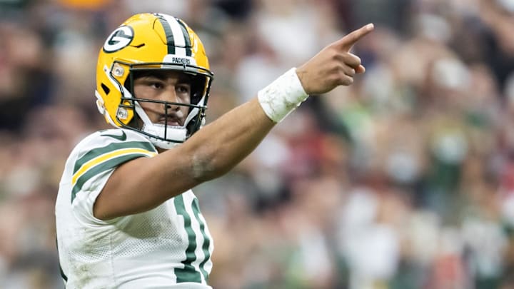 Green Bay Packers quarterback Jordan Love (10) celebrates a first down against the Arizona Cardinals on Sunday. Green Bay Packers quarterback Jordan Love (10) celebrates a first down against the Arizona Cardinals on Sunday.