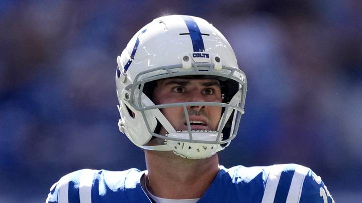Indianapolis Colts quarterback Daniel Jones reacts after throwing an interception