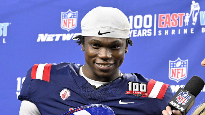 Jan 30, 2025; Arlington, TX, USA; East running back Jacory Croskey-Merritt of Arizona (31) is presented with the offensive MVP trophy after the East defeats the West in the East-West Shrine Bowl at AT&T Stadium. Mandatory Credit: Jerome Miron-Imagn Images