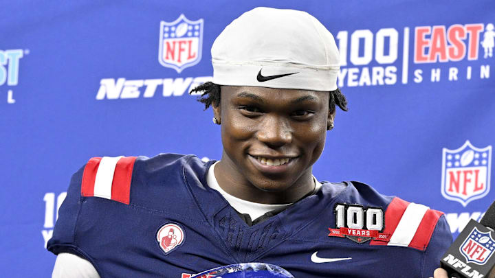 Jan 30, 2025; Arlington, TX, USA; East running back Jacory Croskey-Merritt of Arizona (31) is presented with the offensive MVP trophy after the East defeats the West in the East-West Shrine Bowl at AT&T Stadium. Mandatory Credit: Jerome Miron-Imagn Images